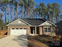 Newly constructed brick home with a two-car garage at 112 Imperial Way # 2A, Albemarle, NC 28001