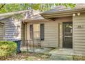 House exterior with a small patio and landscaping at 151 Cedar Hollow St, Fort Mill, SC 29715