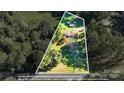 Aerial view showing house, lot lines, and outbuildings at 665 Childers Rd, Cleveland, NC 27013