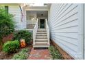 Front entrance with steps and brick walkway at 272 Millingport Ln, New London, NC 28127