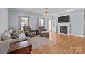 Spacious living room with hardwood floors and a cozy fireplace at 165 Rebecca Ln, Salisbury, NC 28146