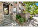 Clean and well maintained building entrance with steps and landscaping at 706 N Davidson St, Charlotte, NC 28202