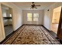 Bright dining room with hardwood floors and natural light at 704 Mcadenville Rd, Lowell, NC 28098