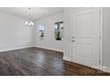 Bright dining area with hardwood floors and access to the exterior at 3012 Puddle Pond Rd # 567, Indian Trail, NC 28079