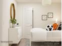 Bedroom with white dresser, white bed, and soccer ball decor at 110 Dorian Pl, Troutman, NC 28166