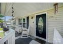 Inviting front porch with rocking chairs at 1123 Golden Maple Ln, Chester, SC 29706
