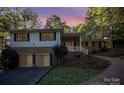 Two-story house with attached garage and brick exterior at 681 Pine Bluff Cir, Kannapolis, NC 28081