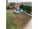 Ranch-style home with a large backyard and driveway at 418 Summer Ridge Rd, Stanley, NC 28164