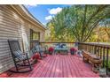 Inviting deck with rocking chairs, perfect for relaxing outdoors at 120 Forest St, Rockwell, NC 28138