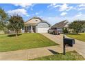 One-story house with blue and beige siding, a two-car garage, and a driveway at 3157 Delaware Dr, Denver, NC 28037