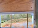 Covered patio with wood ceiling and view of the backyard at 615 Sandycrest Dr, Cherryville, NC 28021