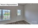 Entryway with white door and glass accents at 8060 Kennesaw Dr, Gastonia, NC 28056