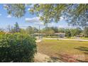 Landscaped front yard with homes in background at 1924 Lakeview Dr, Rock Hill, SC 29732