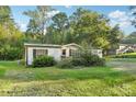 View of the mobile home from the backyard at 1472 Fritts Ave, Fort Mill, SC 29715