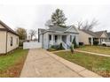 Front yard view of a gray house with driveway at 139 Ebenezer Ave, Rock Hill, SC 29730
