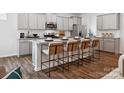 Eat-in kitchen with granite countertops and island seating at 1053 Bull Dog Ln, Wingate, NC 28174