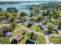 Aerial view showcasing home's location near the lake at 309 Commodore Loop, Mooresville, NC 28117