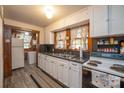 Cozy kitchen with white cabinets and a stove at 710 Wood St, Statesville, NC 28677