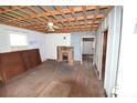 Empty living room with exposed ceiling beams and fireplace at 25 Bennett Dr, Kings Mountain, NC 28086