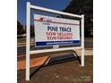 Adams Homes Pine Trace townhomes now selling sign at 4057 Port Richmond Ave # 13, Gastonia, NC 28056