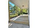 Spacious front porch with wooden posts and flooring at 112 Maple St, Shelby, NC 28150