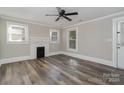 Bright living room with hardwood floors and ceiling fan at 807 Klondale Ave, Kannapolis, NC 28081