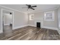 Spacious living room featuring hardwood floors and a fireplace at 807 Klondale Ave, Kannapolis, NC 28081
