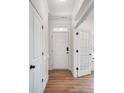 Bright entryway with hardwood floors and white trim at 5234 Verona Rd # 79, Charlotte, NC 28213