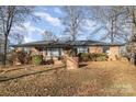 Brick ranch house with a well-maintained lawn at 2441 Country Club Rd, Lincolnton, NC 28092