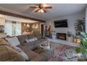 Cozy living room featuring a fireplace and sectional sofa at 113 Danritch Dr, Richfield, NC 28137