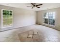 Living room featuring tile floor and lots of natural light at 3219 Irwin Valley Ct, Charlotte, NC 28269