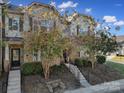 Charming 3-story townhome with welcoming front porch at 5020 Mockernut Ln, Fort Mill, SC 29707