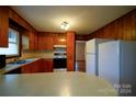 Kitchen with wood cabinets and appliances at 200 Wilson Ave, York, SC 29745