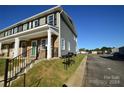 Townhouse exterior with stone and gray siding at 3722 Windy Pine Nw Ln, Hickory, NC 28601