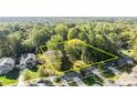 Aerial view of a wooded lot ready for new construction at 201 Smithfield Dr, Charlotte, NC 28270