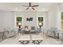 Bright and airy living room with cozy seating at 2612 Senior Dr, Charlotte, NC 28216