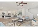 Open floor plan with kitchen, living, and dining areas at 2612 Senior Dr, Charlotte, NC 28216