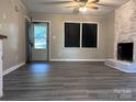 Living room with fireplace and vinyl plank flooring at 526 Kings Rd, Shelby, NC 28150
