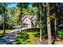 Aerial view of house with tree-lined driveway at 3905 Granite St, Terrell, NC 28682