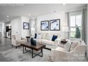 Spacious living room featuring neutral colors and ample natural light at 107 Jameson Park Dr # 3, Troutman, NC 28166