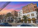Brick building with multiple units and street-level businesses at 1315 East Blvd # 408, Charlotte, NC 28203