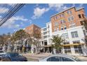 Brick building with multiple units and street-level businesses at 1315 East Blvd # 408, Charlotte, NC 28203
