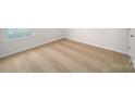 Bright bedroom with neutral walls and carpet at 3863 Maxwell Henry Nw Ln, Conover, NC 28613
