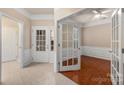 Bright and spacious entryway with hardwood floors and access to multiple rooms at 45014 Wigeon Ln # 100, Indian Land, SC 29707