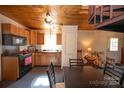 Efficient kitchen with wood cabinets and dining area at 1111 & 1075 Turkey Creek Ridge Rd, York, SC 29745