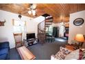 Cozy living room with spiral staircase and wood accents at 1111 & 1075 Turkey Creek Ridge Rd, York, SC 29745