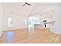 Open concept kitchen with island and white cabinets at 103 Bunker Hill Ln, Statesville, NC 28677