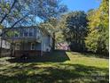 House with a large backyard and green lawn at 602 W Council St, Salisbury, NC 28144