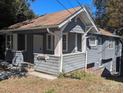Gray craftsman style house with a large porch at 602 W Council St, Salisbury, NC 28144