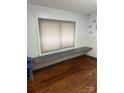 Room with hardwood floors and a built-in workspace at 3238 Campbell Dr, Charlotte, NC 28205